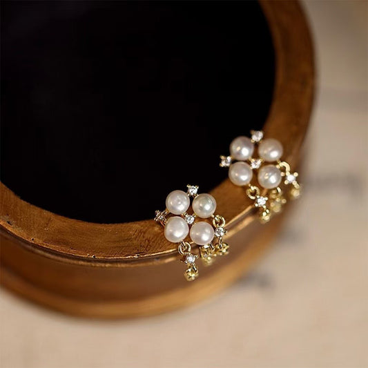 Sterling silver pearl earrings with four-leaf clover design and 4-5mm freshwater pearls