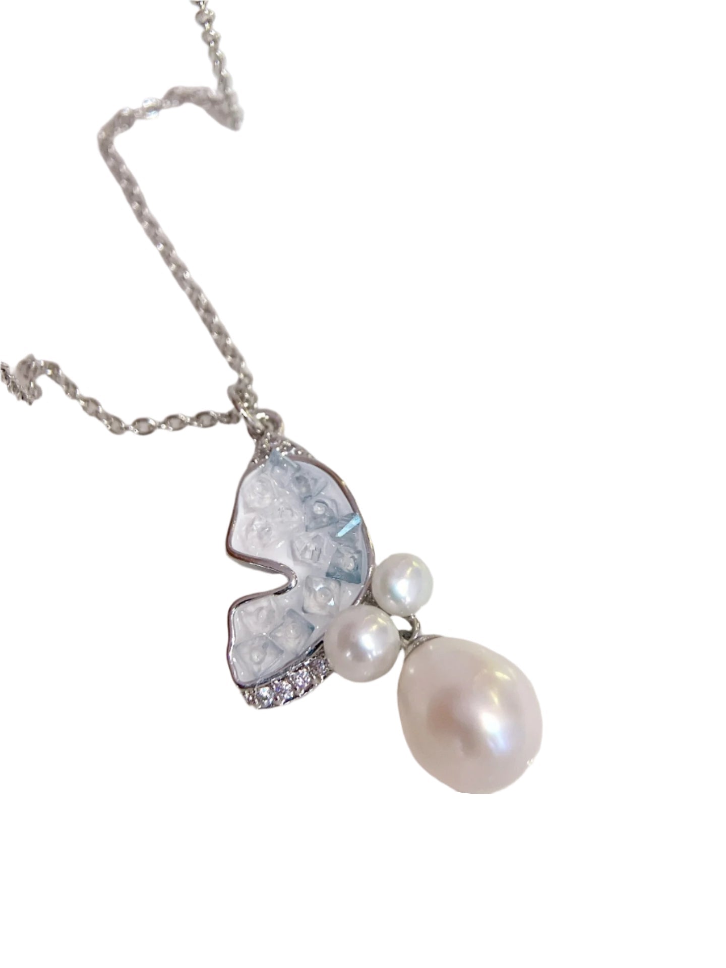 Close-up of butterfly pendant with high-luster freshwater pearls and 14K gold-filled chain