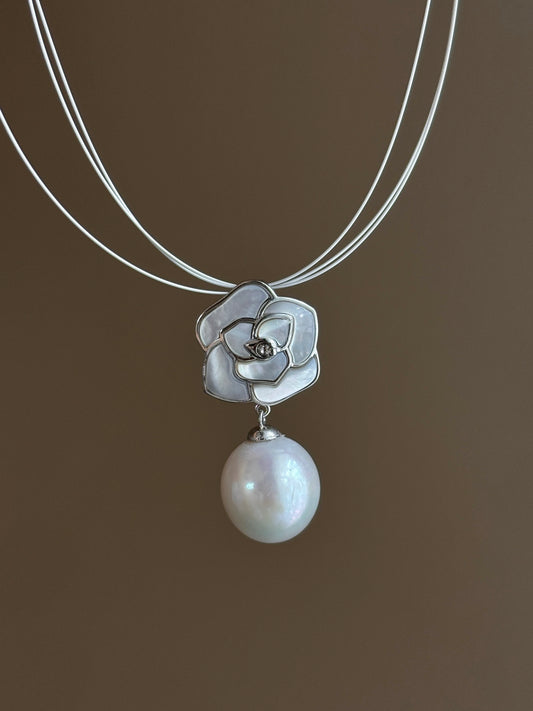 Camellia choker necklace with mother-of-pearl and Edison teardrop pearl on white background
