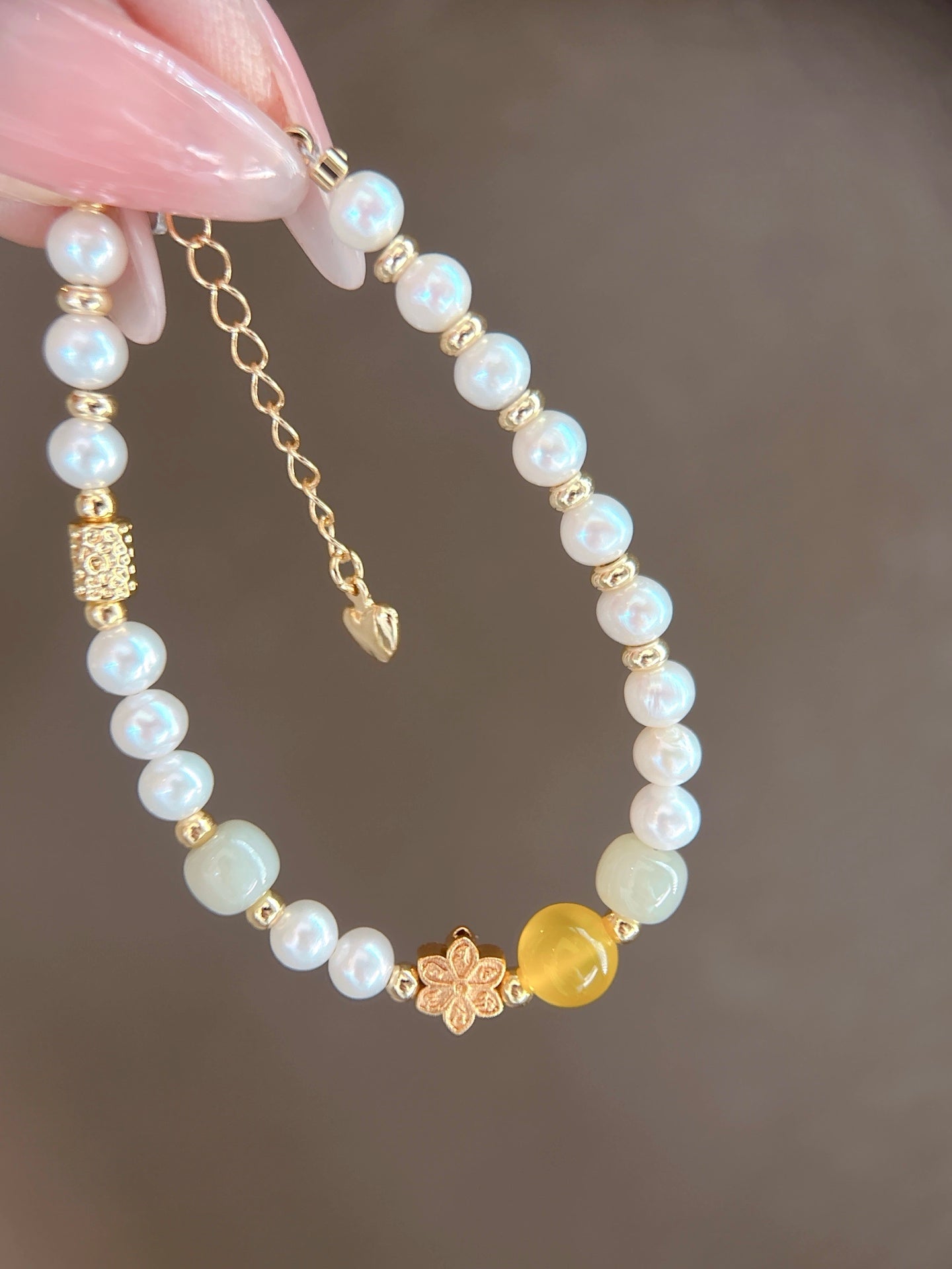 Close-up of natural pearls and sparkling crystal accents