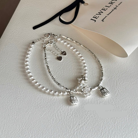 Sterling silver bracelet with lotus flower and blessing 福 charm 