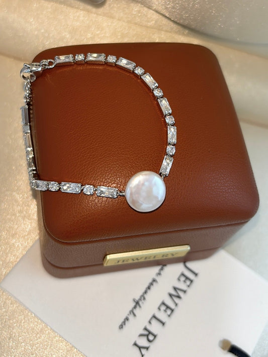 Baroque button pearl bracelet with aurora finish and zircon accents