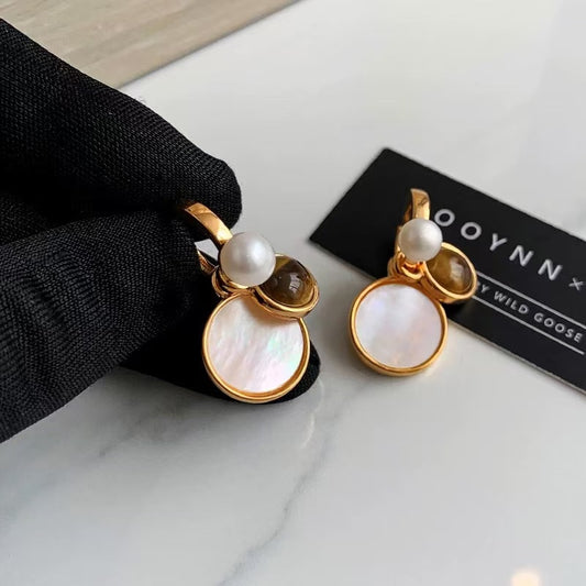 Earrings in warm Maillard-inspired tones