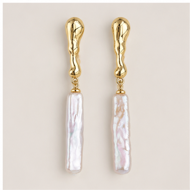Pair of long white baroque stick pearl drop earrings with warm gold-colour organic studs
