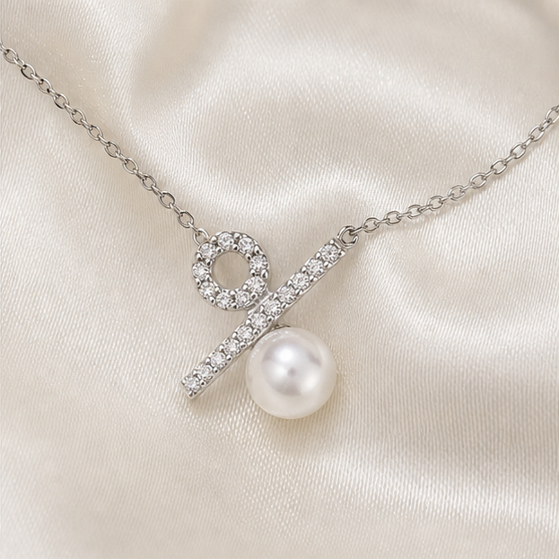 Macro product detail of Ratio – Minimalist Pearl Percentage Necklace