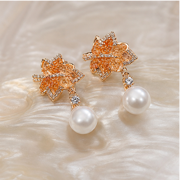 Gradient Maple Leaf Crystal Earrings – Freshwater Pearl & Designer Edition in a product-only clear glass still life
