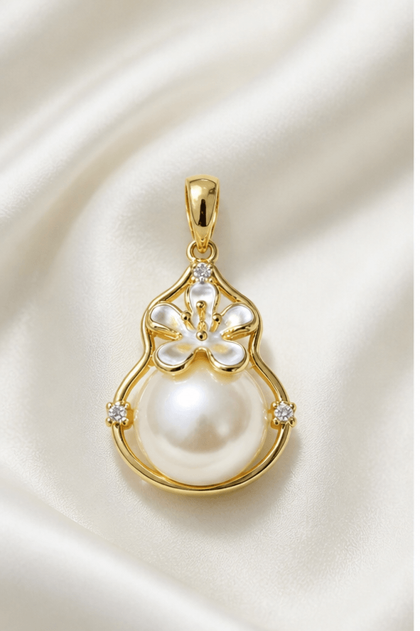 Elysian Pearl Gourd Mabe Pearl Pendant in a product-only ivory studio setting