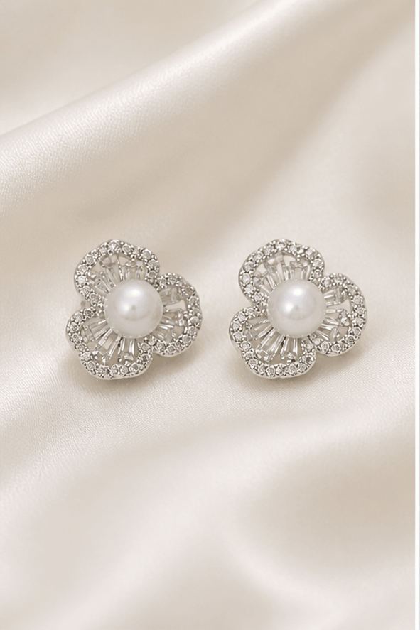 Elysian Pearl Clover Pearl Stud Earrings in a product-only ivory studio setting