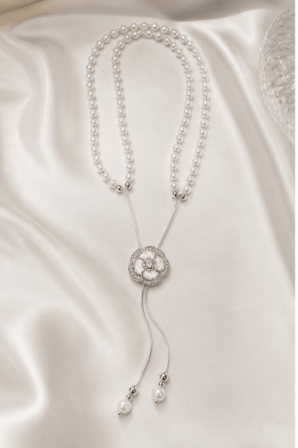 Elysian Pearl White Camellia Pearl Long Necklace in a product-only ivory studio setting