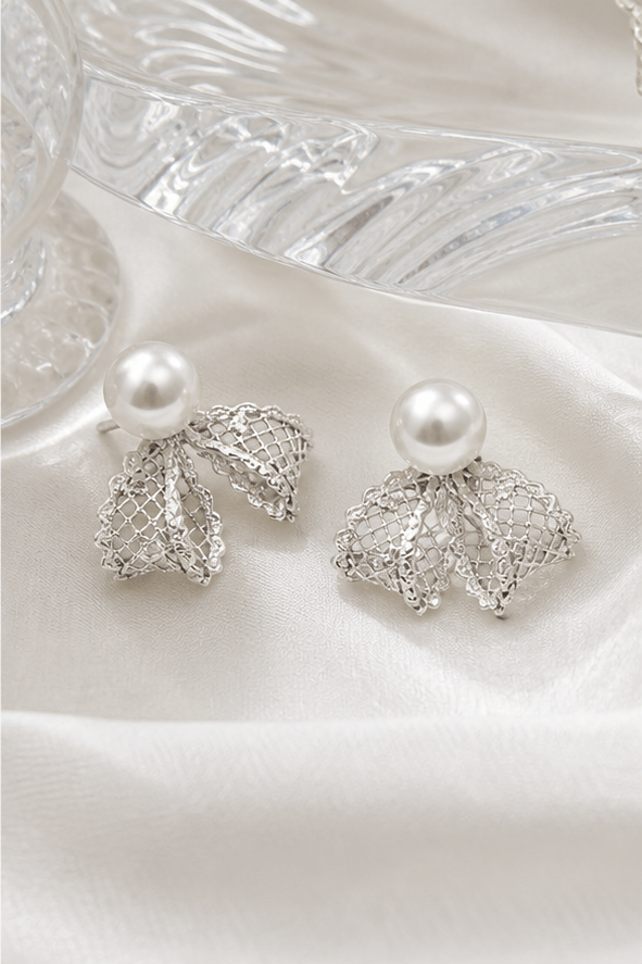 Elysian Pearl Lace Bow Pearl Stud Earrings in a product-only pearl-grey still life