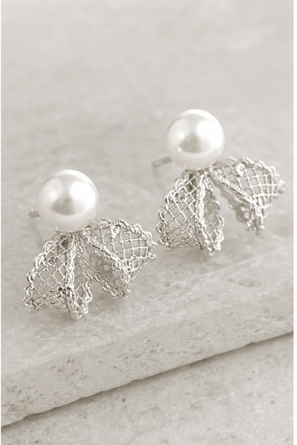 Macro product detail of Elysian Pearl Lace Bow Pearl Stud Earrings