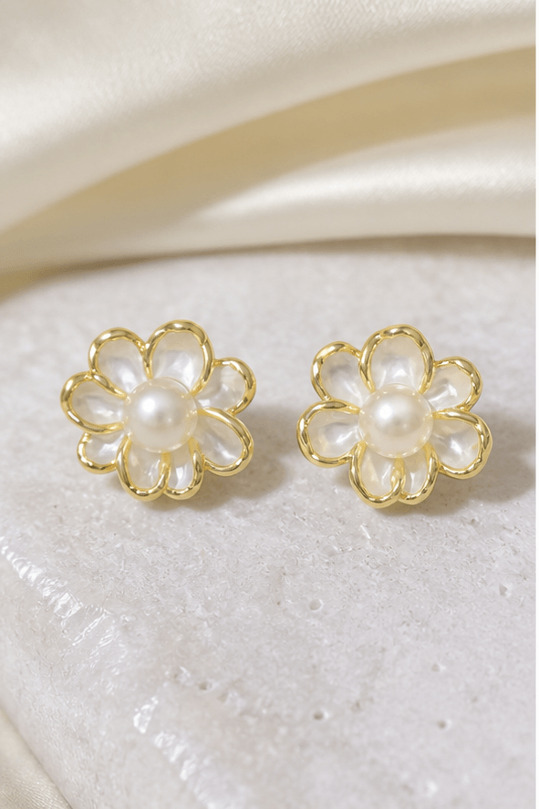 Elysian Pearl Ivory Flower Pearl Stud Earrings in a product-only ivory studio setting