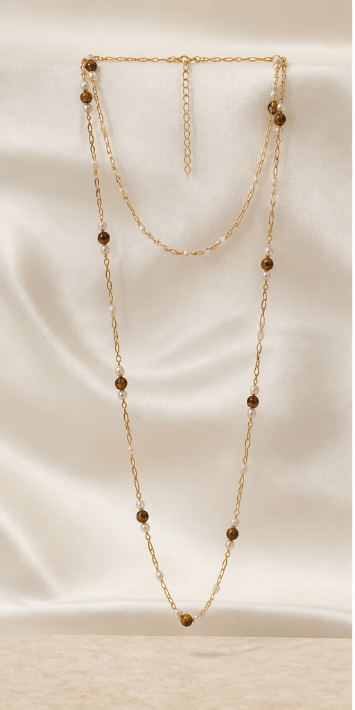 Elysian Pearl Tiger Eye Pearl Constellation Necklace in a product-only ivory studio setting