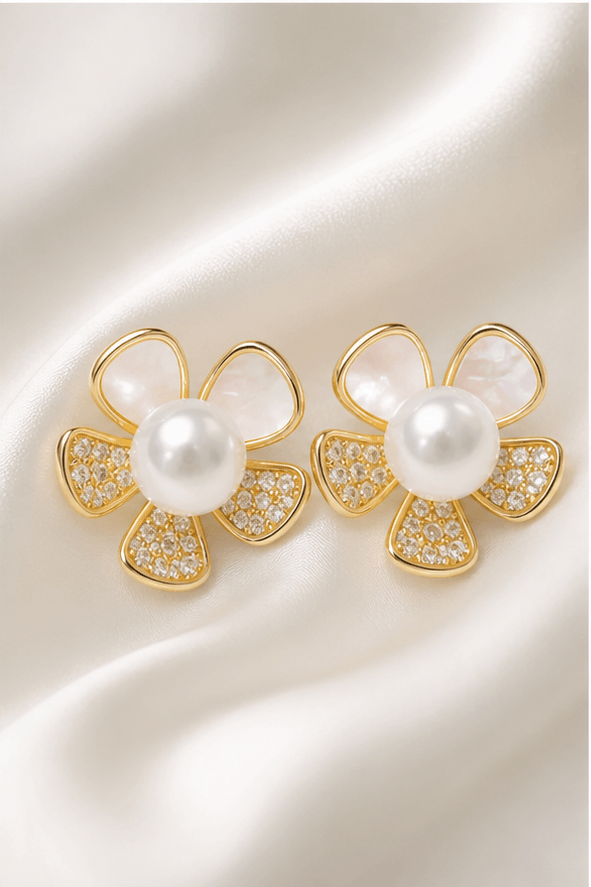 Elysian Pearl Camellia Mother of Pearl Earrings in a product-only ivory studio setting