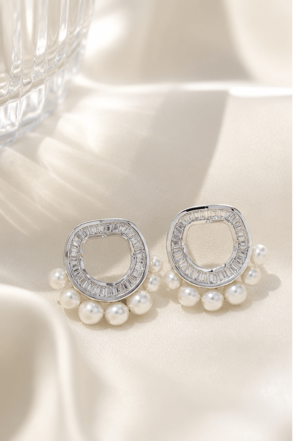 Elysian Pearl Vintage Circle Pearl Stud Earrings in a product-only ivory studio setting