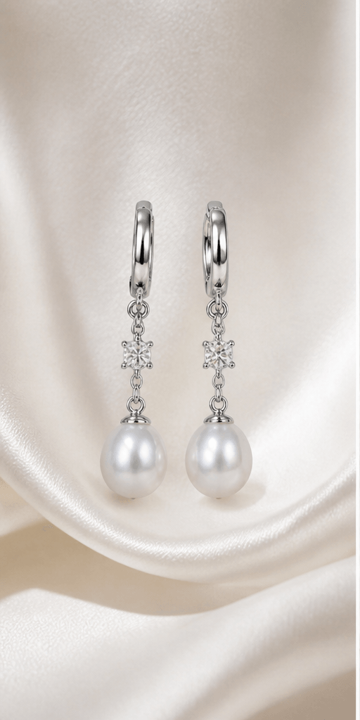 Elysian Pearl Pearl Rain Ear Cuffs in a product-only ivory studio setting
