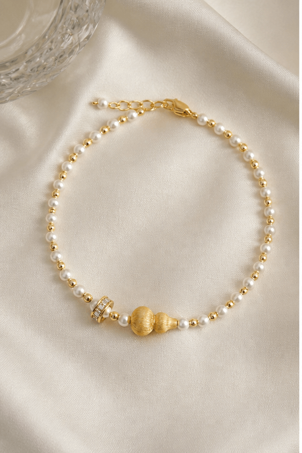 Elysian Pearl Brushed Gourd Pearl Bracelet in a product-only ivory studio setting