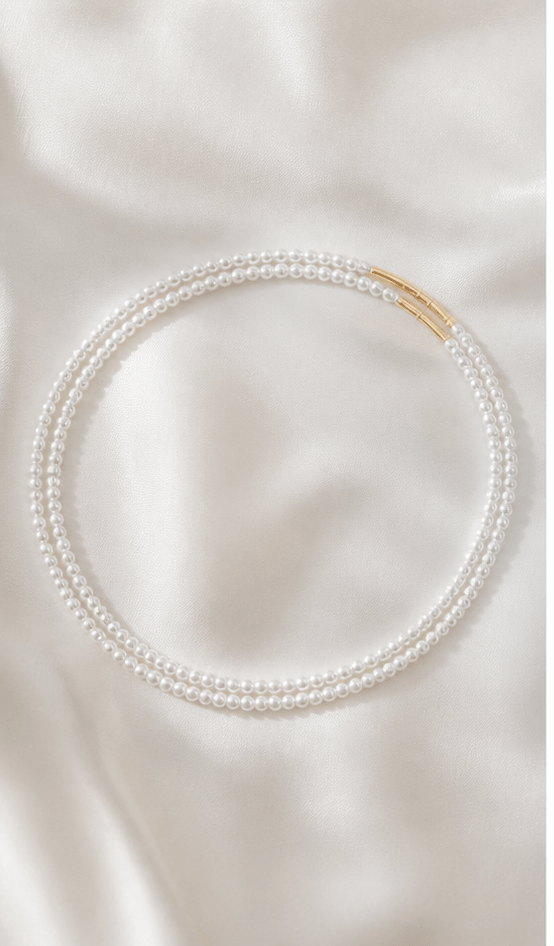 Elysian Pearl Fine Millet Pearl Necklace in a product-only ivory studio setting