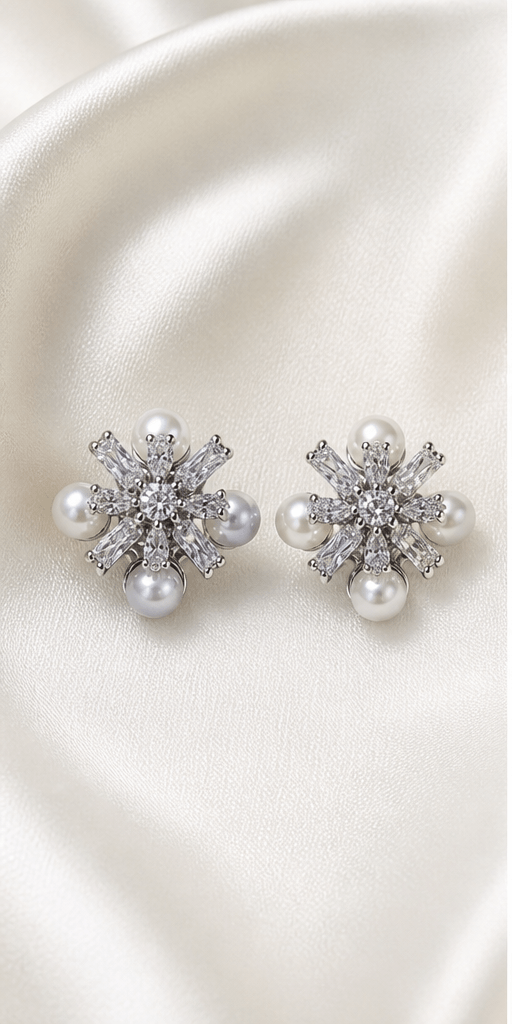 Elysian Pearl Snowflake Pearl Stud Earrings in a product-only ivory studio setting