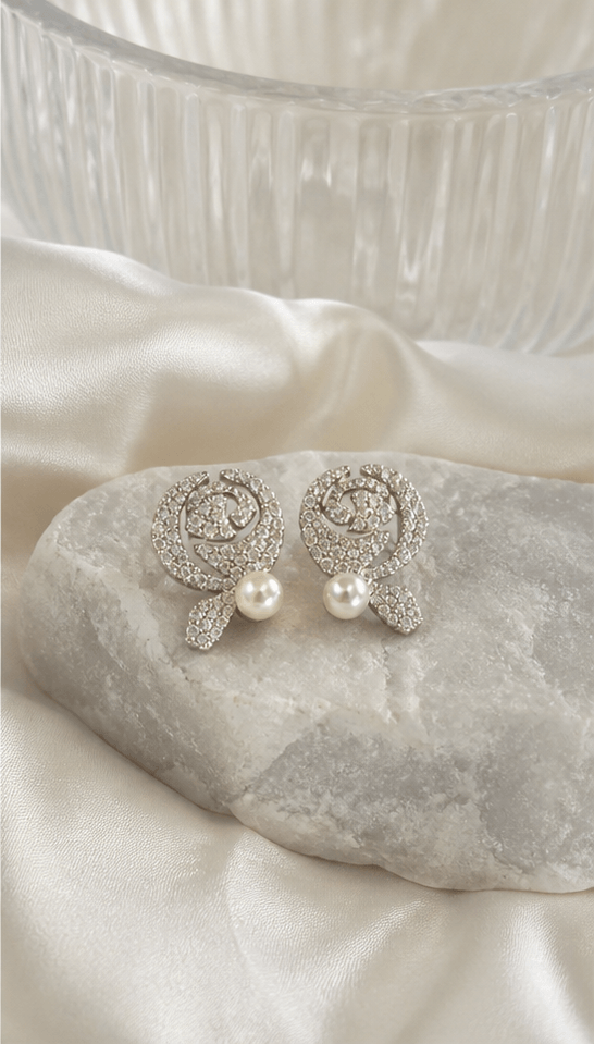 Elysian Pearl Rose Pearl Stud Earrings in a product-only pearl-grey still life