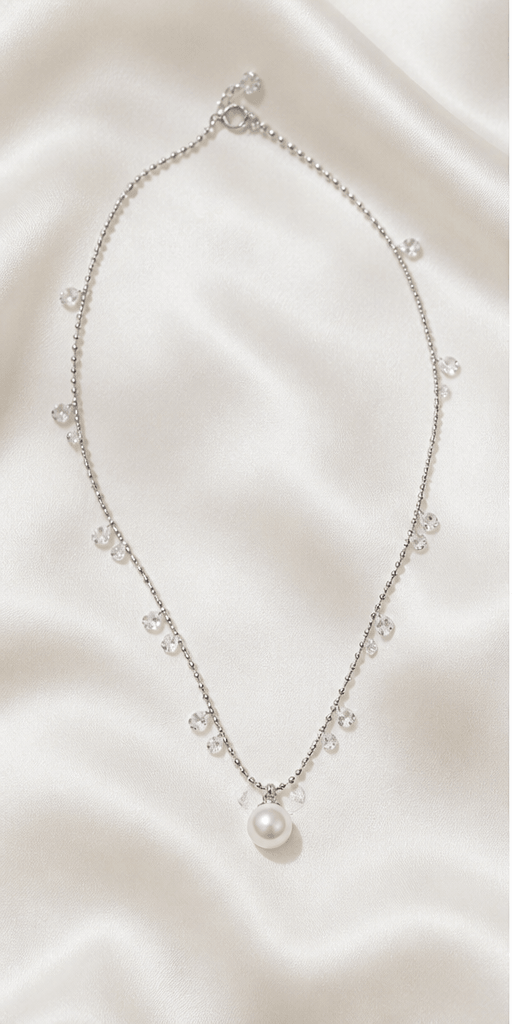 Elysian Pearl Starlight Pearl Drop Necklace in a product-only ivory studio setting