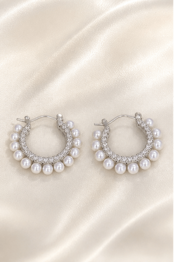 Elysian Pearl Pearl Donut Hoop Earrings in a product-only ivory studio setting
