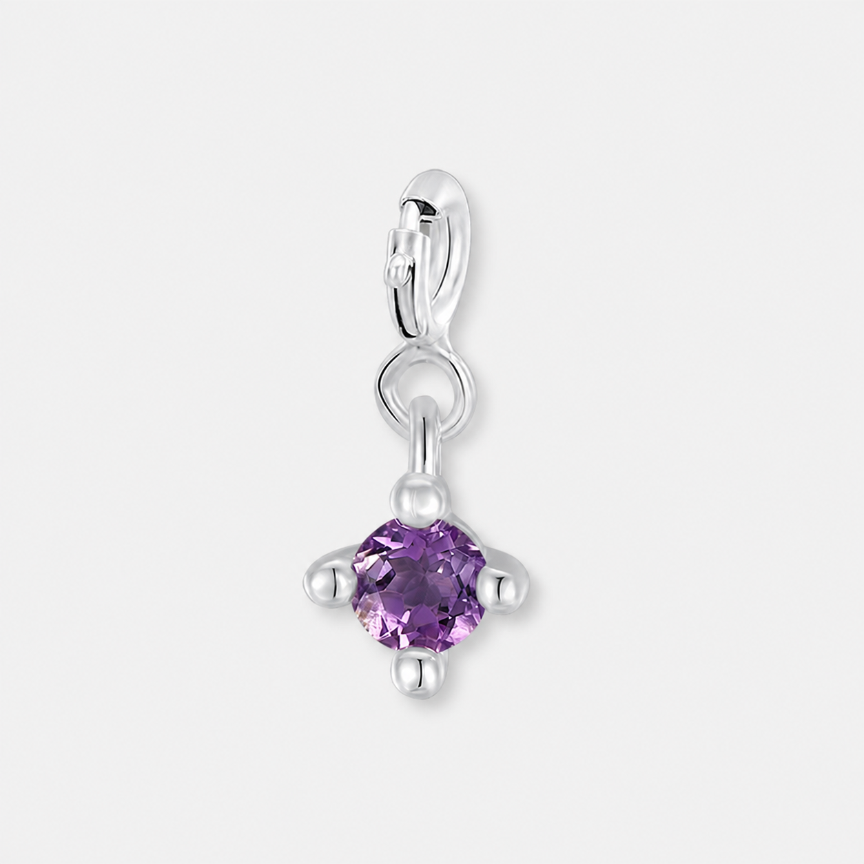Luna Veil Amethyst Spark pendant in sterling silver on a pearl-grey studio background