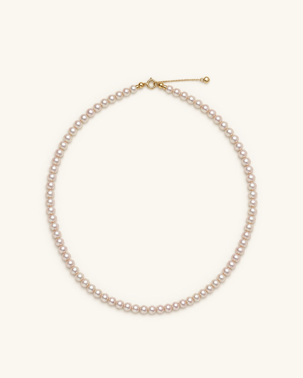 5–5.5mm Freshwater Pearl Strand – Gold Clasp